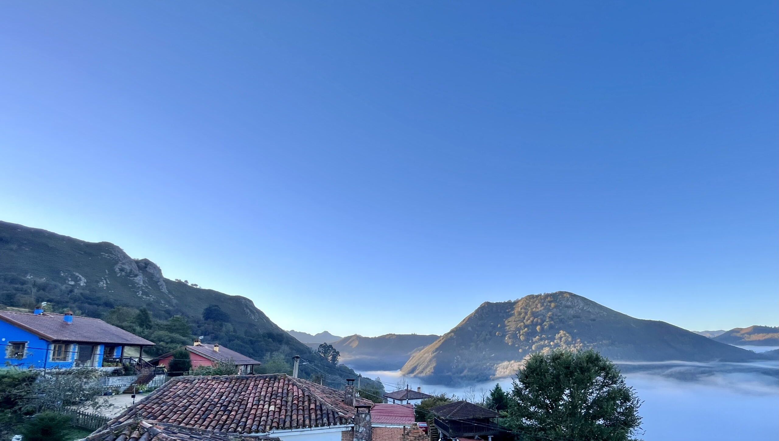 Welcome to Asturias Retreats 1 village rooftop scaled 1